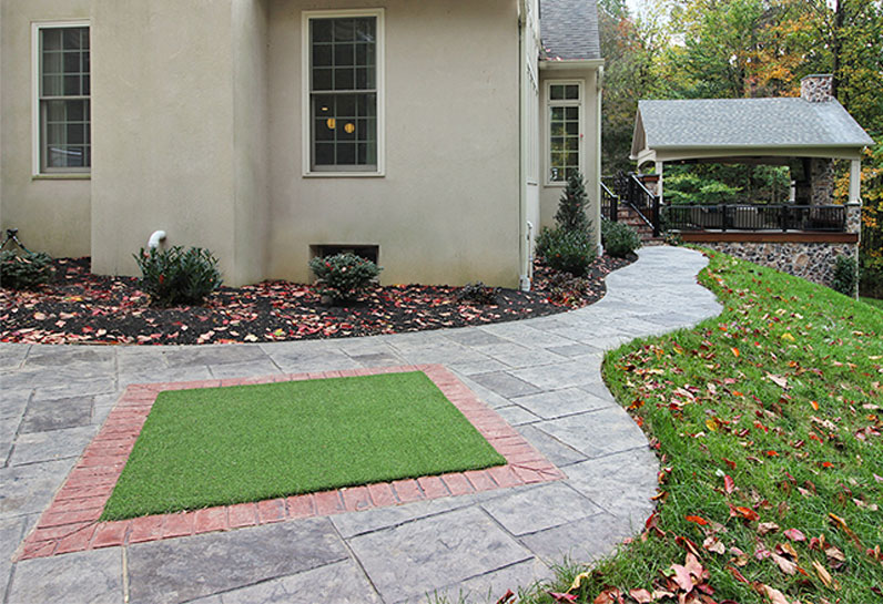pitch and putt green on custom patio deck with putting green