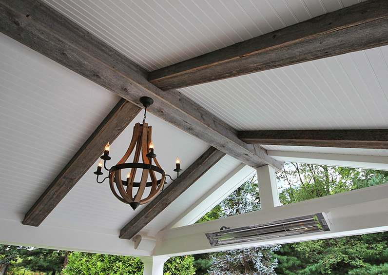 porch with barnwood and hanging lights patio with hanging light fixtures