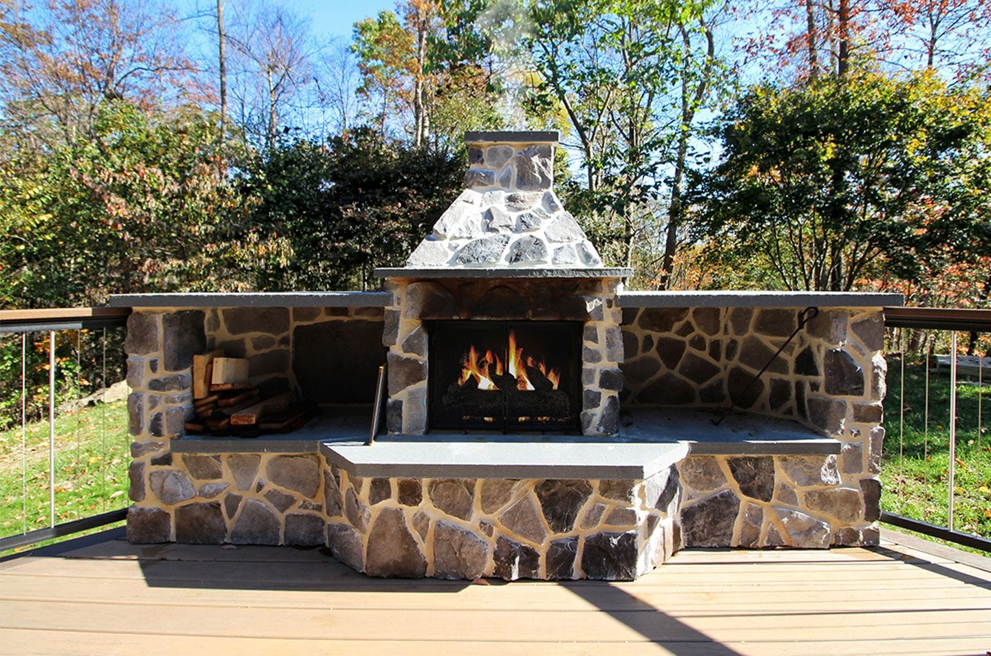 trex spiced rum deck with stone fire feature stone fire feature deck add-on